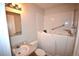 Bathroom featuring walk-in tub for easy access and safety at 2685 W Asbury Ave, Denver, CO 80219