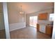 Charming eat-in kitchen area with wood cabinets and stainless steel sink at 2685 W Asbury Ave, Denver, CO 80219