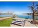 Lakeside park with picnic tables and grills, perfect for outdoor gatherings and relaxation at 6850 Xavier Cir # 5, Westminster, CO 80030