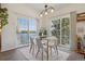 Bright dining area with water views, a modern table, and stylish decor at 6850 Xavier Cir # 5, Westminster, CO 80030