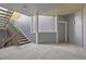 Exterior view of building, featuring stairs, entryway, and gray siding at 6850 Xavier Cir # 5, Westminster, CO 80030