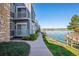Exterior view of the property featuring a lakefront walking path at 6850 Xavier Cir # 5, Westminster, CO 80030