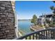 Stunning lake view showcasing the building exterior and waterfront walkway at 6850 Xavier Cir # 5, Westminster, CO 80030