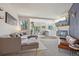 Comfortable living room featuring sectional sofa, stylish decor, and open floor plan at 6850 Xavier Cir # 5, Westminster, CO 80030