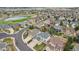 Aerial view of the neighborhood with a golf course in the background at 12110 Bay Oaks Ct, Parker, CO 80138