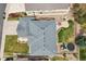 An aerial view of the property showing a landscaped backyard and roof at 12110 Bay Oaks Ct, Parker, CO 80138