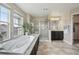 Bright bathroom featuring a soaking tub, shower, and vanity offering a relaxing and functional space at 12110 Bay Oaks Ct, Parker, CO 80138
