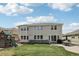 Spacious backyard with patio and playground area, great for families at 12110 Bay Oaks Ct, Parker, CO 80138