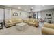 Living room with couches and workout equipment at 12110 Bay Oaks Ct, Parker, CO 80138