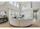 Spacious living room featuring fireplace, high ceilings, and neutral décor at 12110 Bay Oaks Ct, Parker, CO 80138