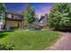 Large backyard with patio, balcony, fire pit, and ample seating at 10016 Teton Ct, Lone Tree, CO 80124