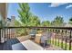 Outdoor balcony providing scenic views of lush greenery, perfect for relaxation and outdoor enjoyment at 10016 Teton Ct, Lone Tree, CO 80124