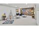 Spacious finished basement with a decorative accent wall, white walls and neutral carpet, perfect for a play area at 10016 Teton Ct, Lone Tree, CO 80124