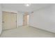 Bright bedroom featuring neutral walls, carpet, and double closet doors providing a blank canvas for personalization at 10016 Teton Ct, Lone Tree, CO 80124