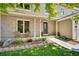 Welcoming front porch with seating and attractive landscaping at 10016 Teton Ct, Lone Tree, CO 80124