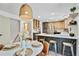 Inviting kitchen with modern appliances, ample cabinet space, and a stylish dining area, perfect for Gathering meals at 10016 Teton Ct, Lone Tree, CO 80124
