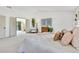 Bright main bedroom with ensuite bathroom and cozy neutral decor at 10016 Teton Ct, Lone Tree, CO 80124
