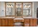 This bathroom features a large vanity and an oversized mirror with custom lighting at 4364 Chateau Ridge Ln, Castle Rock, CO 80108