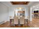 Formal dining room with decorative ceiling and direct access to both the kitchen and living room at 4364 Chateau Ridge Ln, Castle Rock, CO 80108