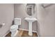 Powder room features a pedestal sink and tiled floor at 17359 Waterhouse Cir # C, Parker, CO 80134