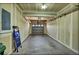Spacious unfinished garage with bare walls and concrete floor at 17359 Waterhouse Cir # C, Parker, CO 80134