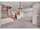 Open floor plan living room featuring stairs, wood railing, and an open kitchen at 17359 Waterhouse Cir # C, Parker, CO 80134