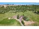 Aerial view of the home on a large lot in a beautiful country setting at 1151 Castlewood Pl, Franktown, CO 80116