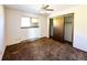 Cozy bedroom with a closet and a window at 1151 Castlewood Pl, Franktown, CO 80116