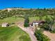 Beautiful home in a rural setting with a rock outcropping backdrop at 1151 Castlewood Pl, Franktown, CO 80116