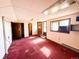 Bright room with red carpet and door at 1151 Castlewood Pl, Franktown, CO 80116