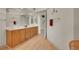 Bathroom features wood floors, wooden vanity with dual sinks, and a large mirror at 153 Gold Run Trl, Idaho Springs, CO 80452
