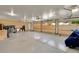 Spacious three car garage with ample storage space, multiple garage doors, and access to the exterior at 153 Gold Run Trl, Idaho Springs, CO 80452