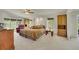 Well lit bedroom featuring neutral carpet, ceiling fan and picturesque windows at 153 Gold Run Trl, Idaho Springs, CO 80452