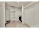 Spacious walk-in closet with built-in shelving and ample storage space for clothes and shoes at 153 Gold Run Trl, Idaho Springs, CO 80452