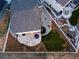 Aerial view of backyard with a patio, fire pit, manicured lawn, and rock garden at 1803 S Coolidge St, Aurora, CO 80018