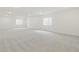 Unfinished basement offers recessed lighting and light bright carpet at 20590 E 58Th Ave, Aurora, CO 80019