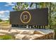 Painted Prairie community entrance sign on a stone base at 20590 E 58Th Ave, Aurora, CO 80019