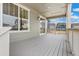 Relax on your covered porch, which also has sliding glass doors for indoor/outdoor living at 20590 E 58Th Ave, Aurora, CO 80019