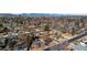 Aerial neighborhood view showing residential streets, houses with a mountain backdrop on horizon at 35 S Cody St, Lakewood, CO 80226