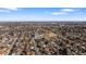 Wide aerial shot of residential neighborhood featuring tree-lined streets and various home styles at 35 S Cody St, Lakewood, CO 80226