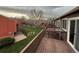 The back deck overlooks a spacious grassy common area at 6921 S Bryant St, Littleton, CO 80120