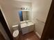 Bathroom with updated vanity at 6921 S Bryant St, Littleton, CO 80120