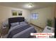 Comfortable bedroom with neutral tones, ready to move in at 6921 S Bryant St, Littleton, CO 80120