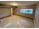 Spacious bedroom with window view awaiting your design, with closet access at 6921 S Bryant St, Littleton, CO 80120