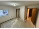 Bedroom with closet and door to bathroom at 6921 S Bryant St, Littleton, CO 80120