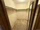 Walk-in closet offers ample storage with a clothes rod, primed for organization at 6921 S Bryant St, Littleton, CO 80120