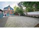 Secluded backyard with a view of the second story, brick accents, and ample space at 2445 W 39Th Ave, Denver, CO 80211