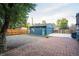 Features a detached blue garage with a teal door, and solar panel at 2445 W 39Th Ave, Denver, CO 80211