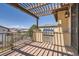 Outdoor kitchen on a shaded deck, ideal for grilling and entertaining with neighborhood views at 9435 Winding Hill Way, Lone Tree, CO 80124