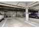 Spacious and well-lit garage with parking and storage at 300 Hudson St # 202, Denver, CO 80220